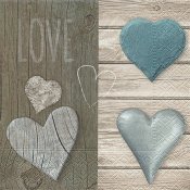 Servetter med texten Love och hjärtan i grå och turkos på bakgrund med brädor i beige