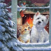 Servett med julmotiv med hund och katt i vintermiljö